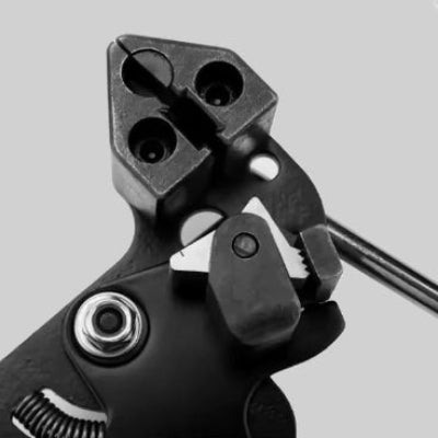 mécanisme pince à sertir