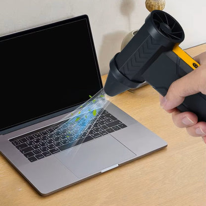 souffleur électrique soufflant un pc