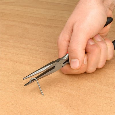 tenue objet pince a bec