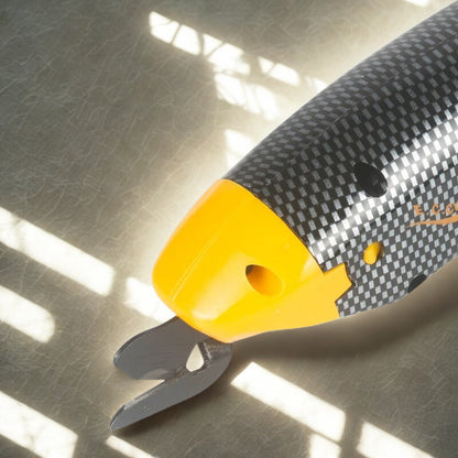 tete ciseaux couture electrique